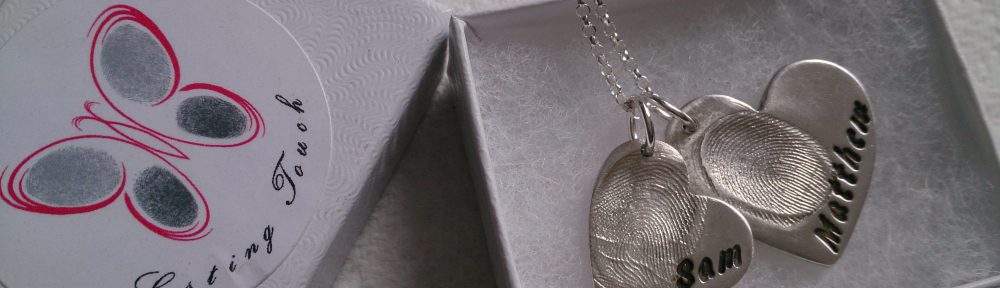 Double fingerprint necklace with 2 heart jewellery charms