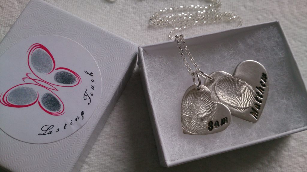 Double fingerprint necklace with 2 heart jewellery charms