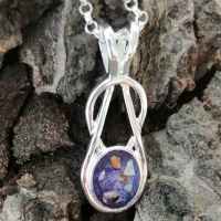 Gold knot pendant with cremation ashes