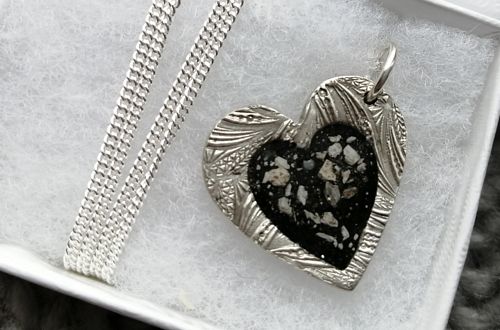 Double sided Silver pendant with cremation ashes